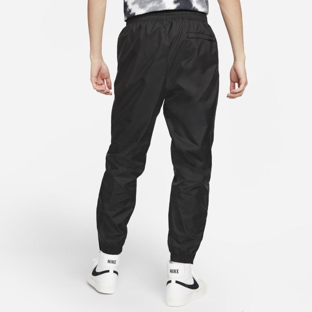 Спортивные штаны Nike M Sportswear Windrunner Track Pants CN8774-010 купить за 7 294 руб в интернет-магазин dealsport.ru